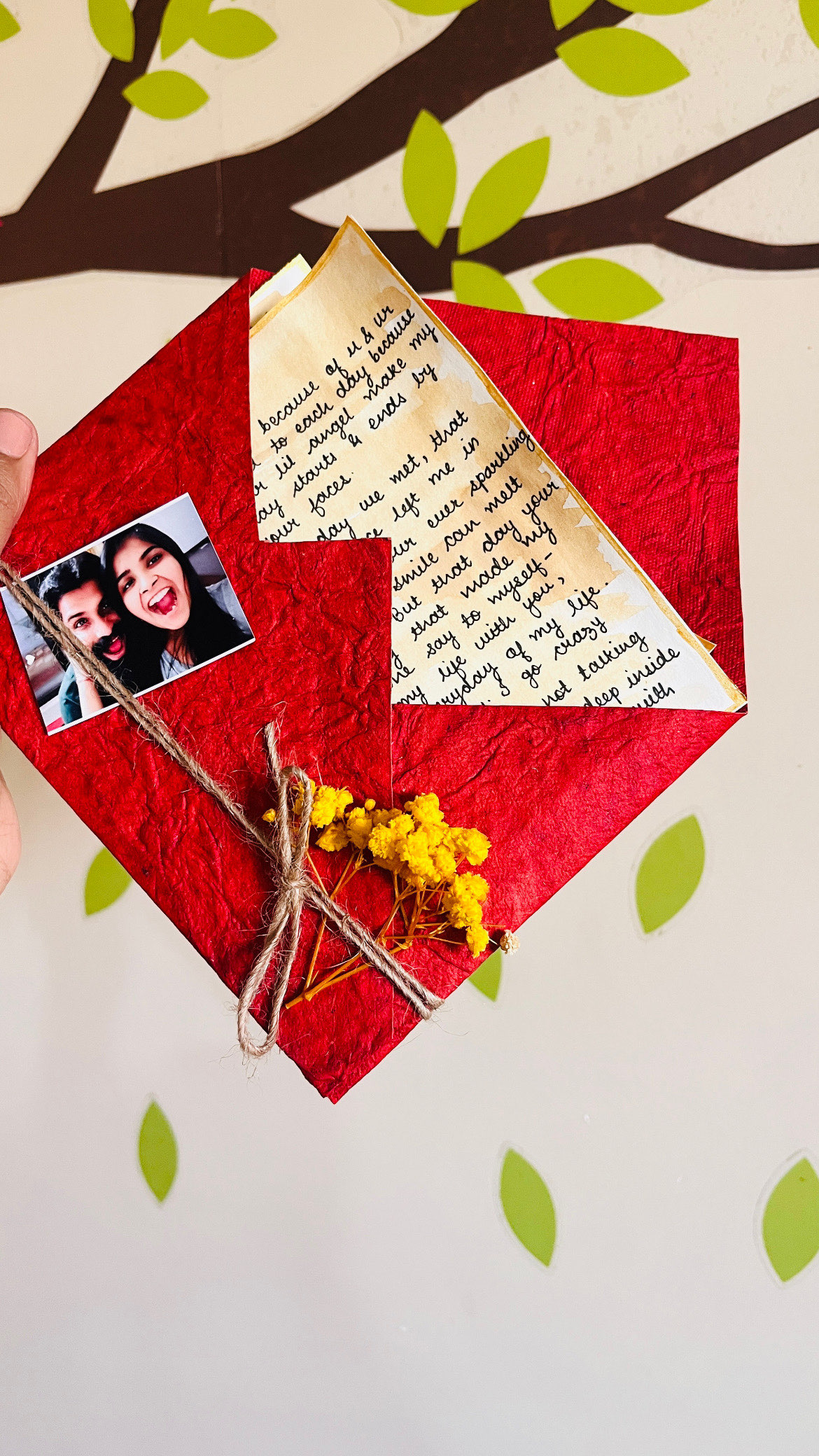 Vintage letters wrapped in red handmade envelope