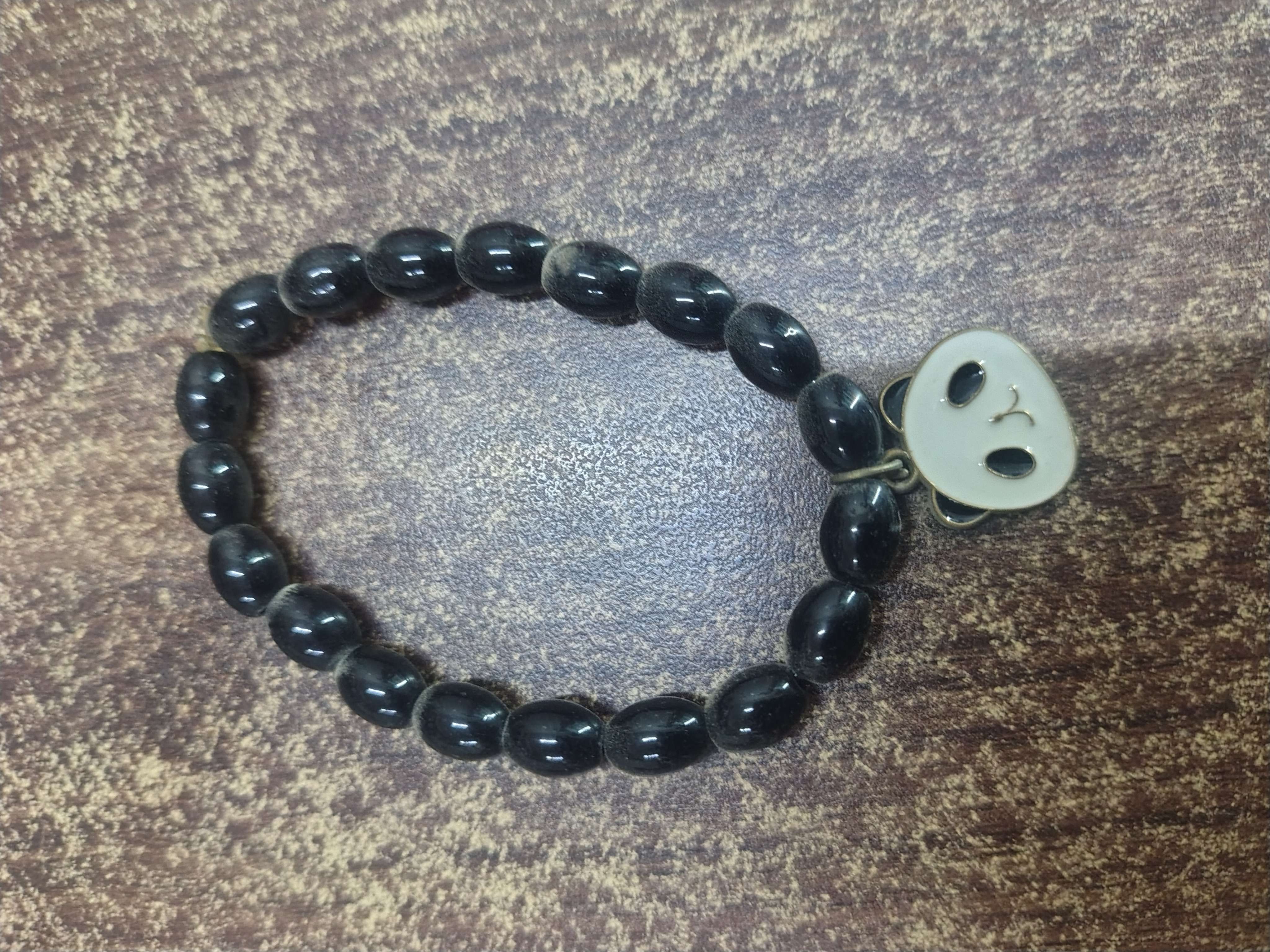 Black Bracelet with Charm