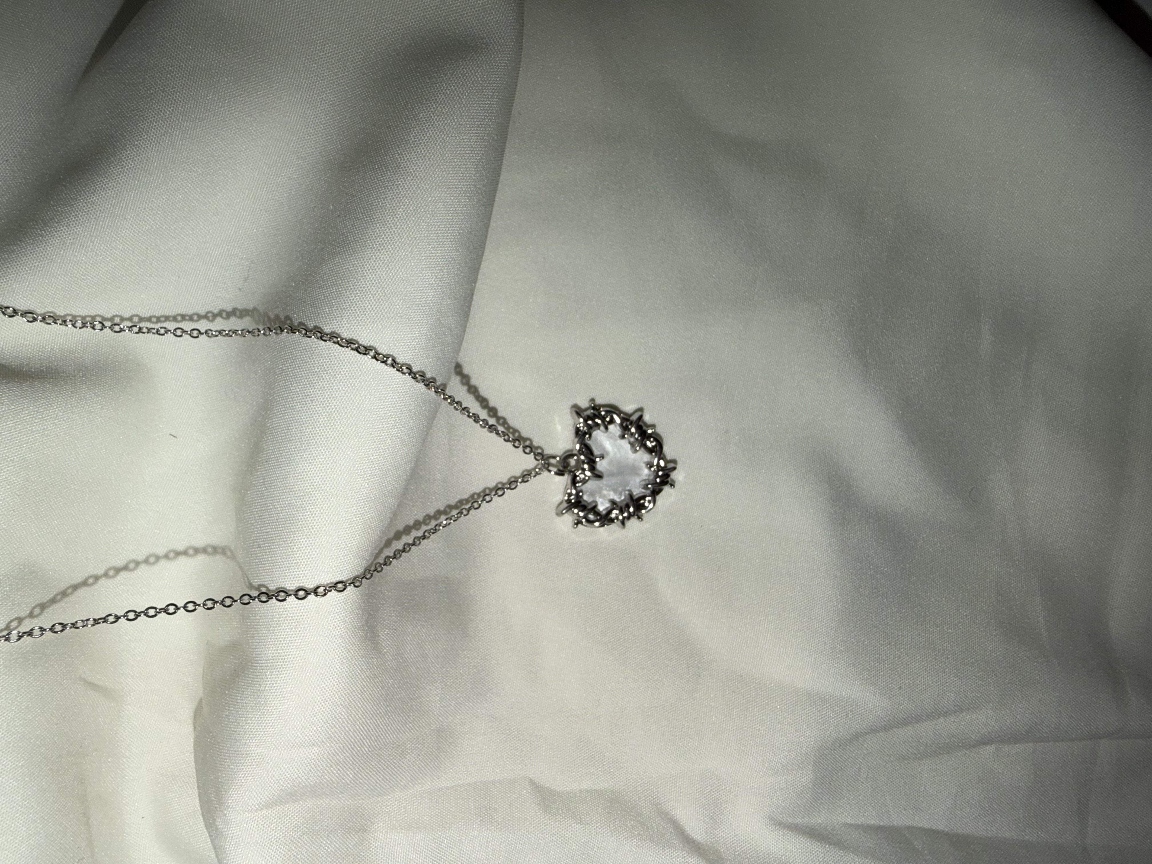 Barbed wire heart necklace