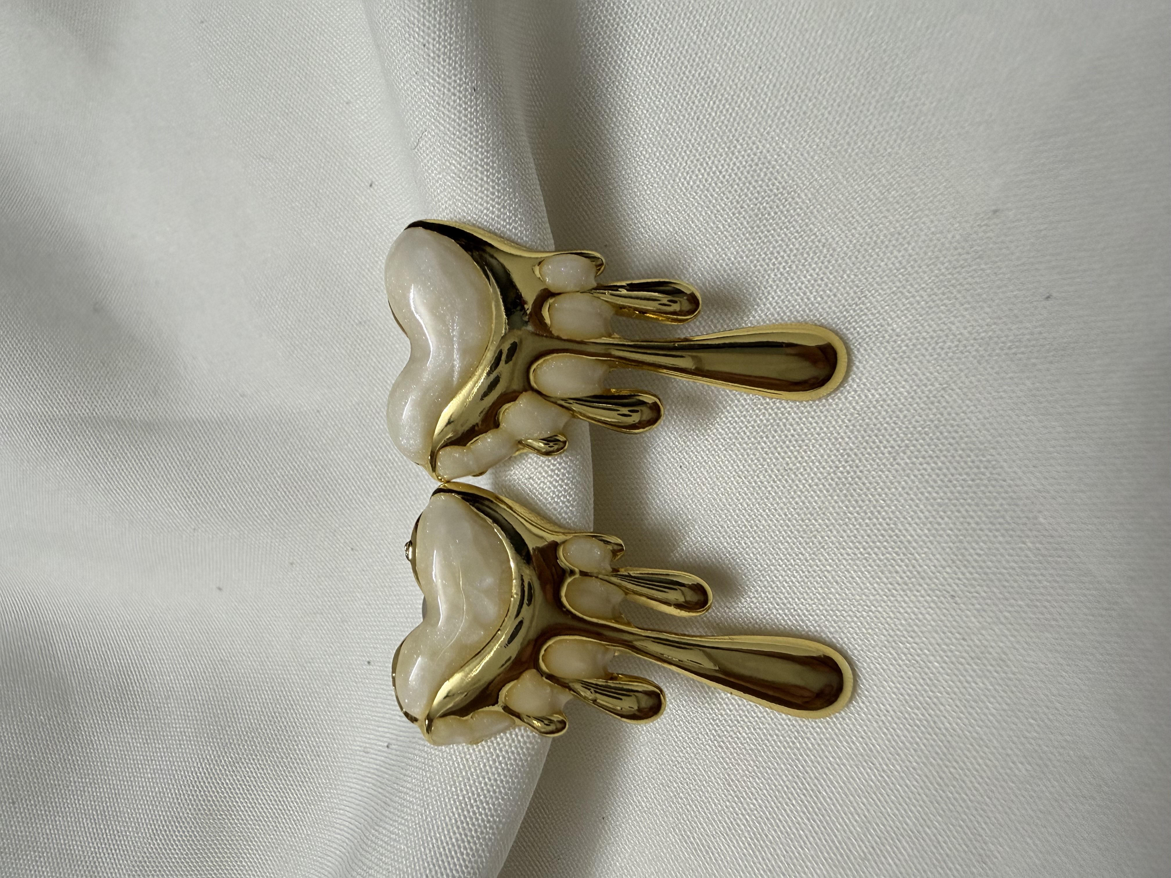 Melting heart earrings